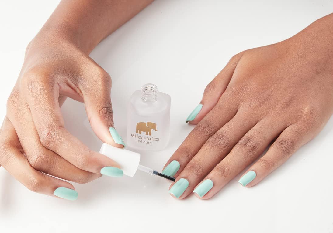 ella+mila "In a Rush Fast Dry Top Coat Nail Polish with High Glossy Shine. This clear nail polish features a UV inhibitor to resist yellowing and comes in a 0.45 fl oz bottle