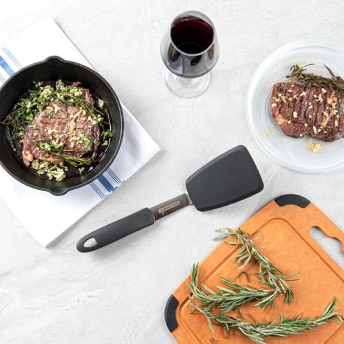 Restaurantware Comfy Grip 12 x 3 Inch Silicone Turner 1 Durable Cooking Turner - Stainless Steel Body Rubber Handle With Hole Black Silicone Flipper Spatula Tolerates Up To 446F Dishwashable