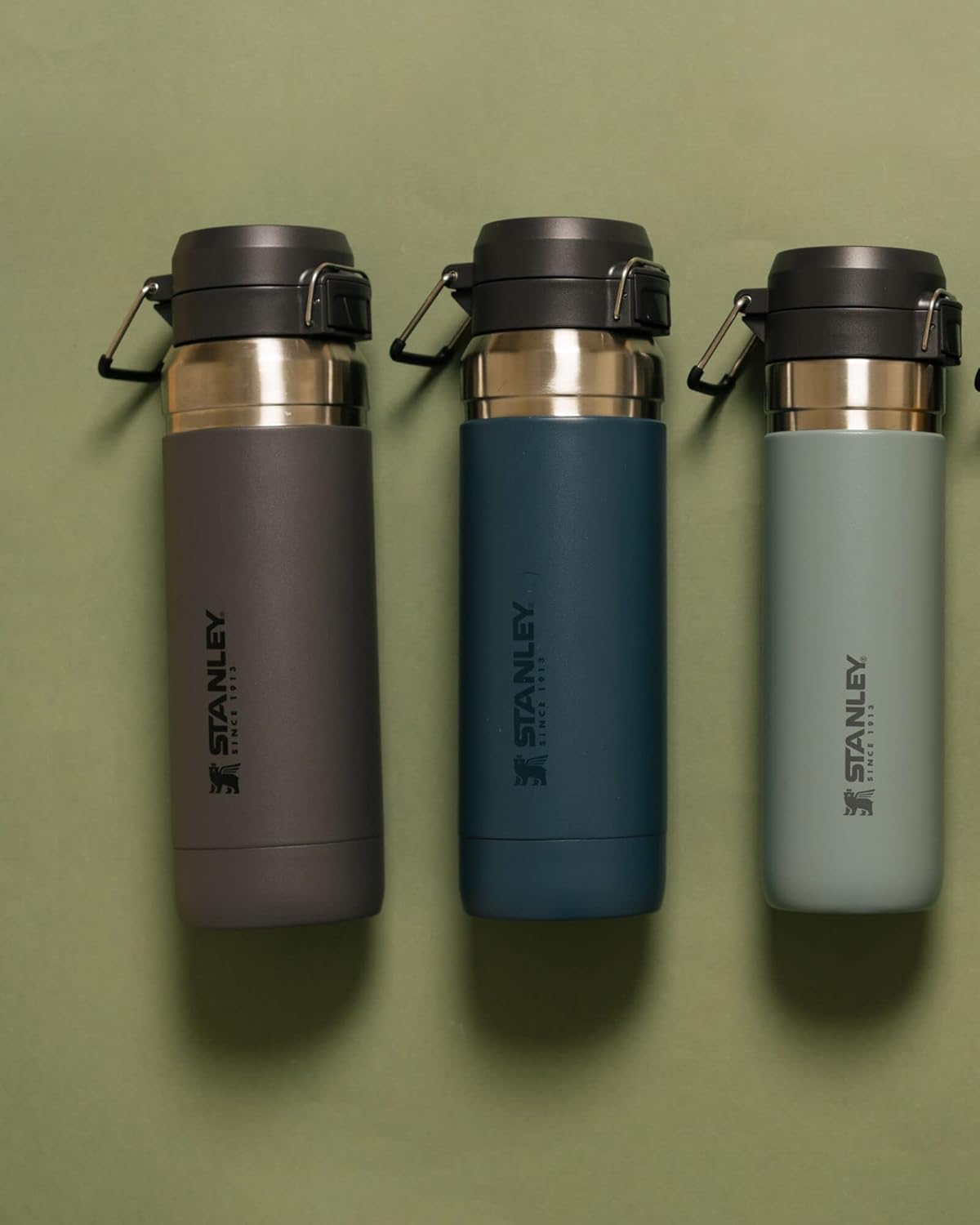 Stanley Quick Flip GO Water Bottle 36 OZ | Push Button Lid | Leakproof & Packable for Travel & Sports | Insulated Stainless Steel | BPA-Free | Charcoal