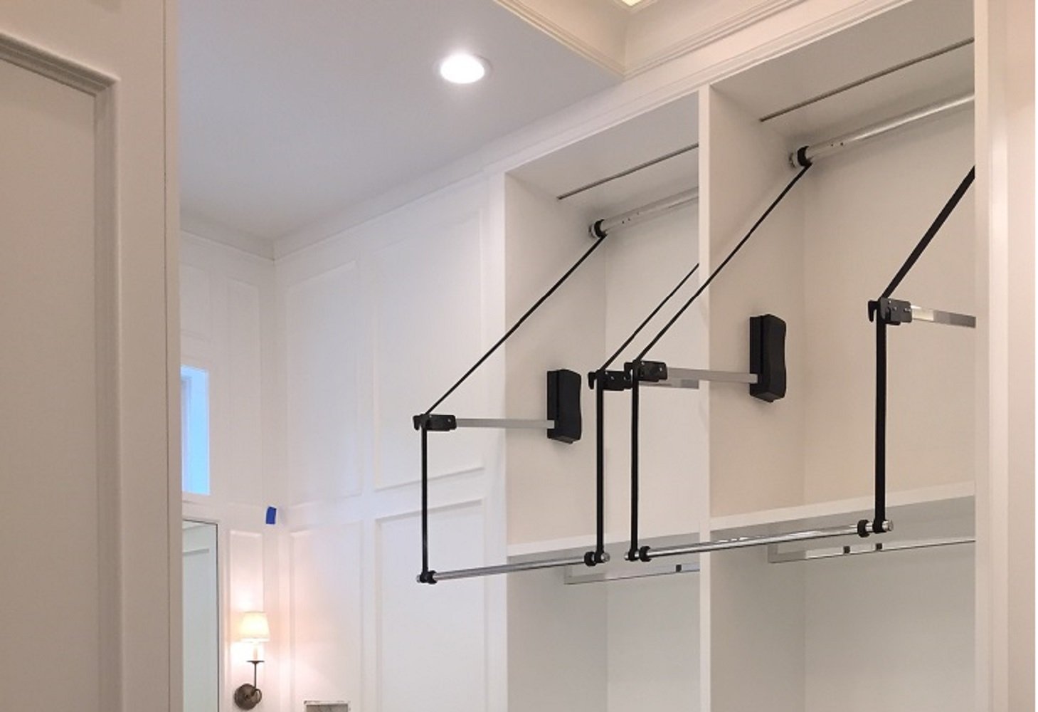 StorageMotion® Motorized Closet Rod/pull down Extended Lift; drops 50"; width between 36" to 48"; Blk polymer base/Chrm plated Arms/Chrm Closet Rod; 75lb weight capacity