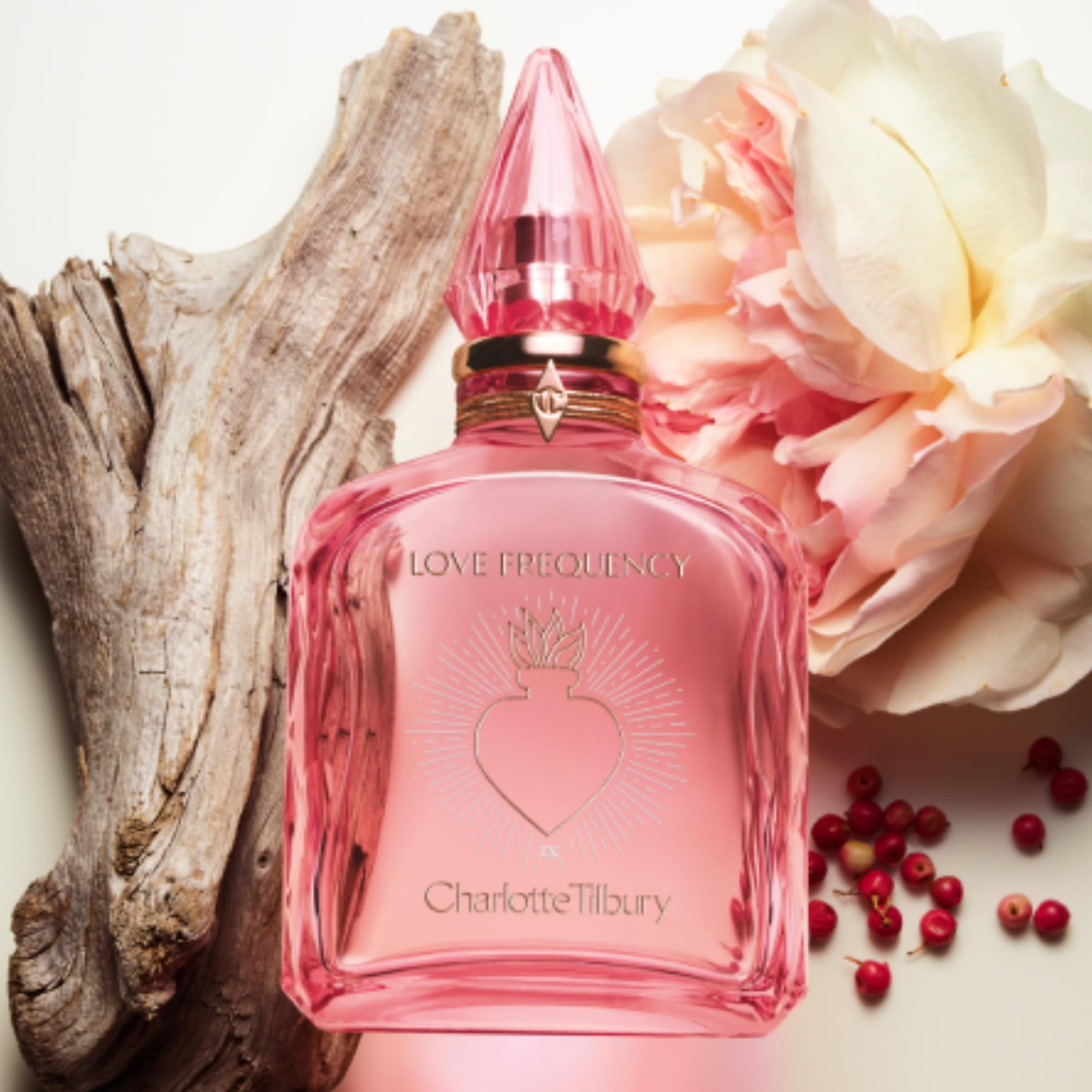 Charlotte Tilbury Love Frequency Eau De Parfum - Emotion-Boosting Floral Perfume Enriched with Naturally-Derived Oils - Long-Lasting Scent with Notes of Patchouli Musk & Rose (10ml)