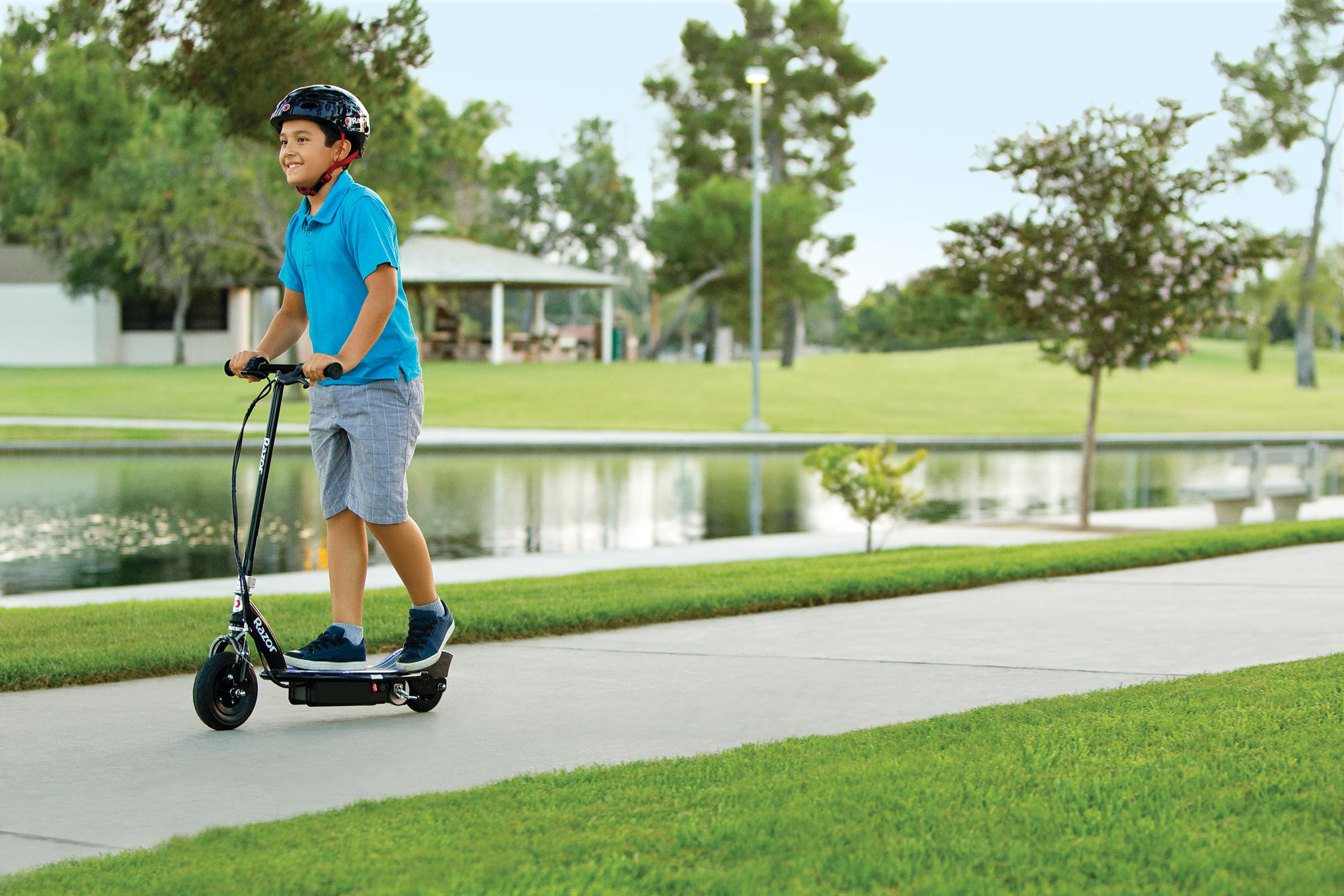 Razor E100 Glow Electric Scooter for Kids Age 8 and Up, LED Light-Up Deck, 8" Air-filled Front Tire, Up to 40 min Continuous Ride Time