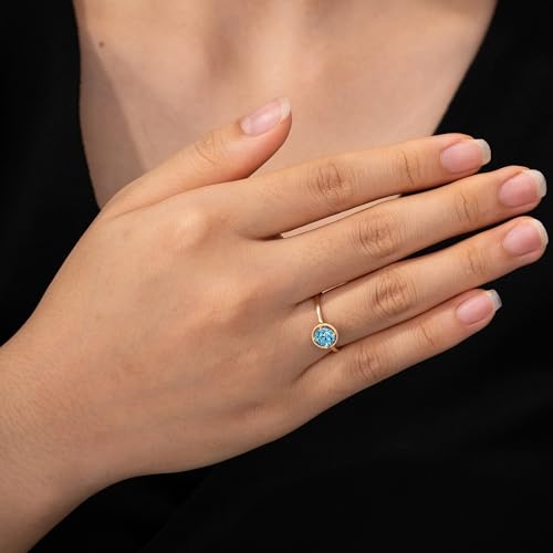 Amazon Essentials 10k Gold Imported Infinite Elements Crystal February Birthstone Ring, Size 7 (previously Amazon Collection)