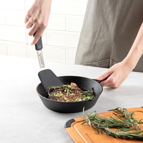 Restaurantware Comfy Grip 12 x 3 Inch Silicone Turner 1 Durable Cooking Turner - Stainless Steel Body Rubber Handle With Hole Black Silicone Flipper Spatula Tolerates Up To 446F Dishwashable