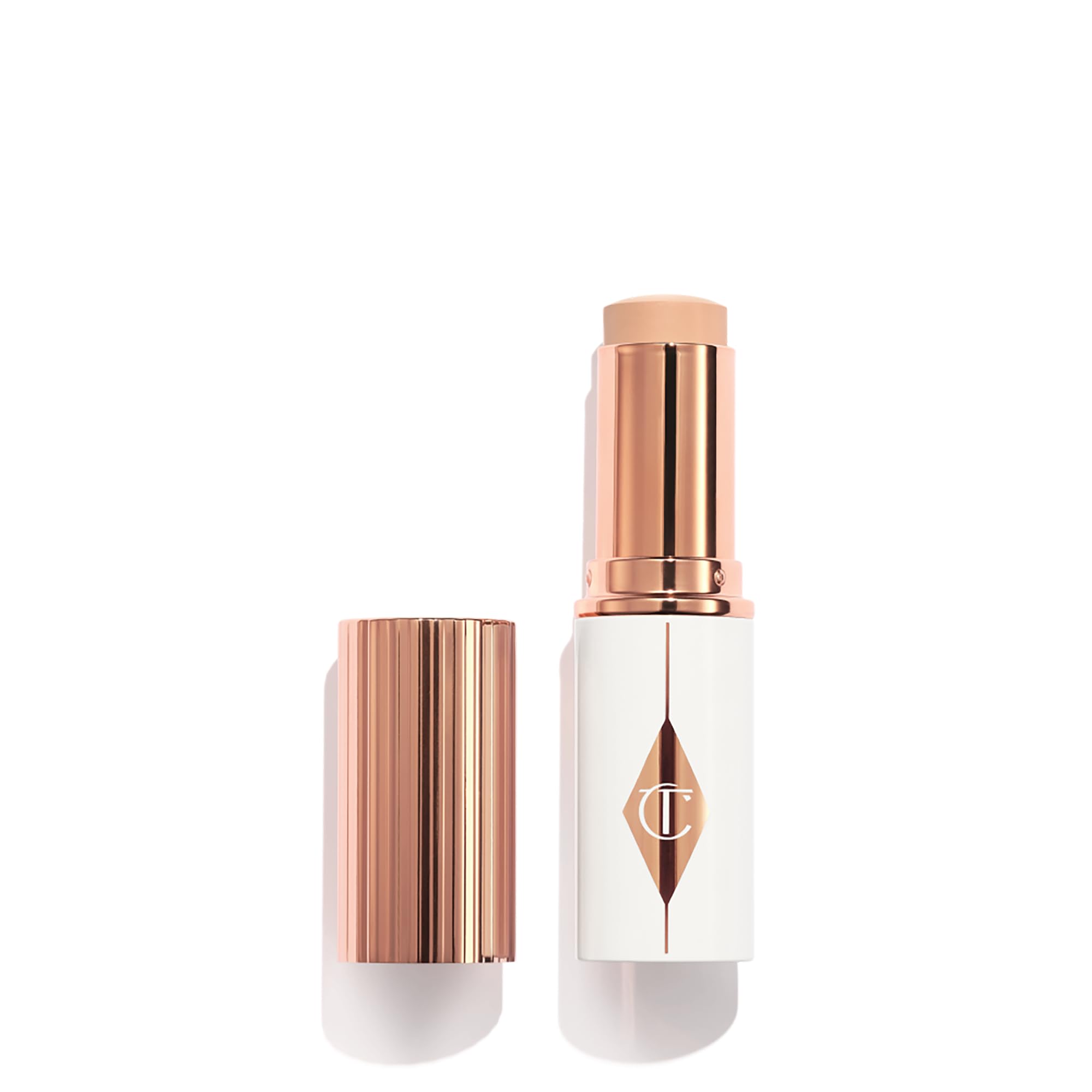 Charlotte Tilbury Unreal Skin Tint & Sheer Glow Hydrating Foundation Stick - Cream Foundation Makeup with Sheer-to-Light Coverage & a Buildable Formula - Blurring, Smoothing & Nourishing - 2 Fair