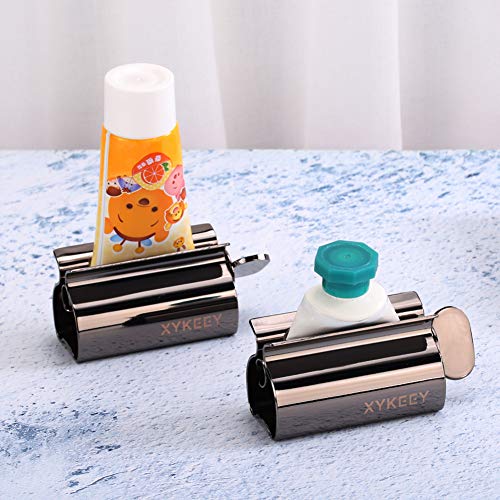 XYKEEY Toothpaste Tube Squeezer - Set of 2 Toothpaste Squeezer Rollers, Metal Toothpaste Tube Wringer Seat Holder Stand (Black)