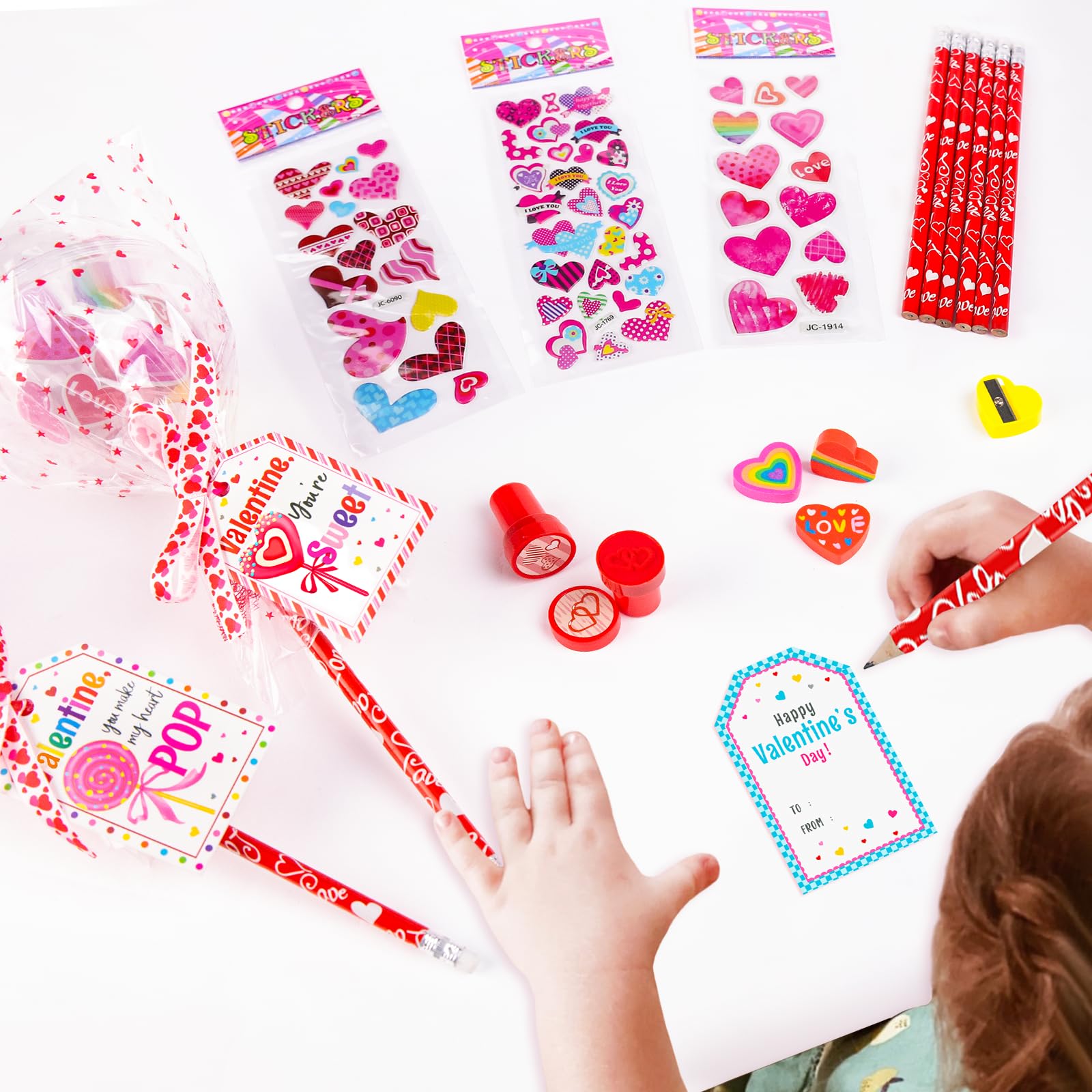 Valentines Day Gifts for Kids - 24 Pack Giant Lollipop-Shaped Stationery Set with Valentine's Cards Pencils Stickers Erasers Stampers Sharpener for Classroom Exchange School Boys Girls Party Favors