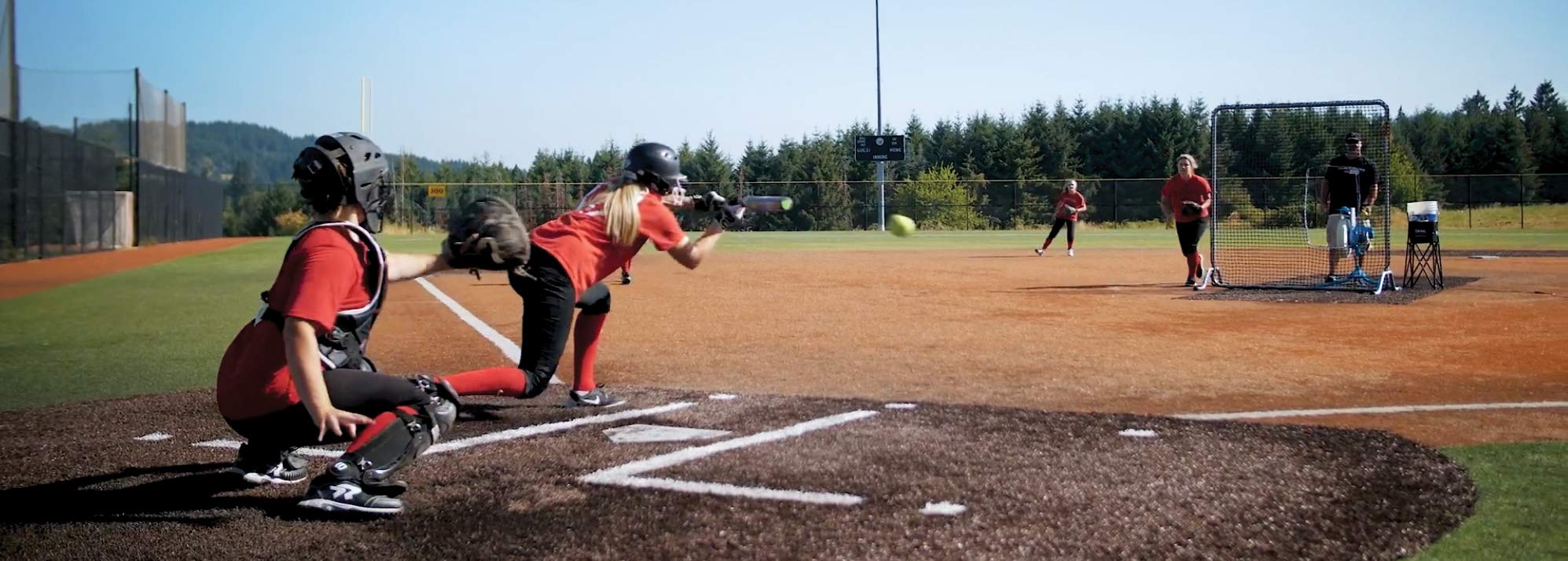 Jugs BP1 Baseball/Softball Combo Pitching Machine — Throws Baseballs or softballs up to 70 mph. Set up for Baseball or Softball, This Machine Throws from a Realistic delivery Height.