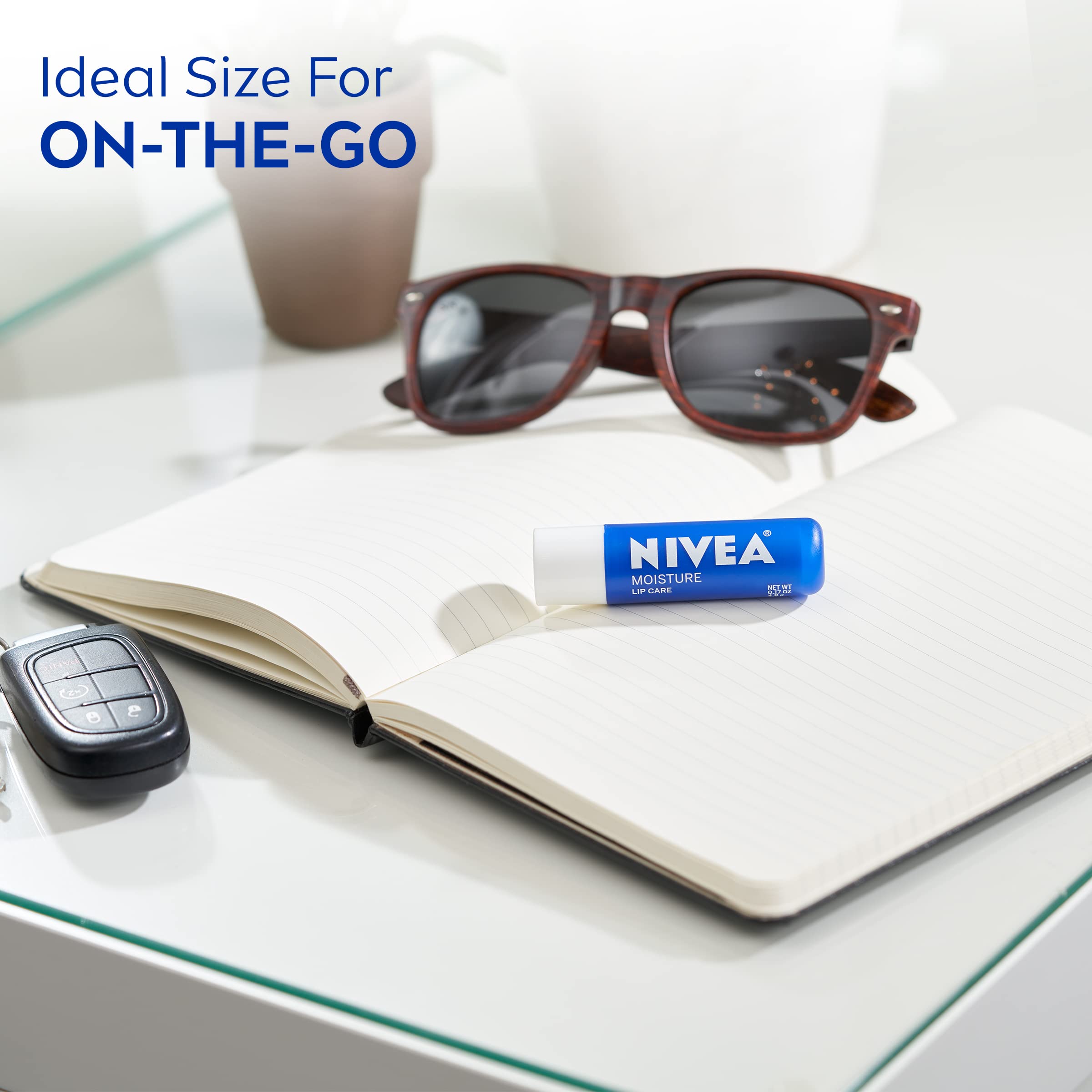 NIVEA Moisture Lip Care, Hydrating Lip Balm with Shea Butter, Nourishing Oils and Vitamin C & E, 3-in-1 Moisture, Repair (for Dry Lips) and Nourish, 0.17 Oz Stick, Pack of 4