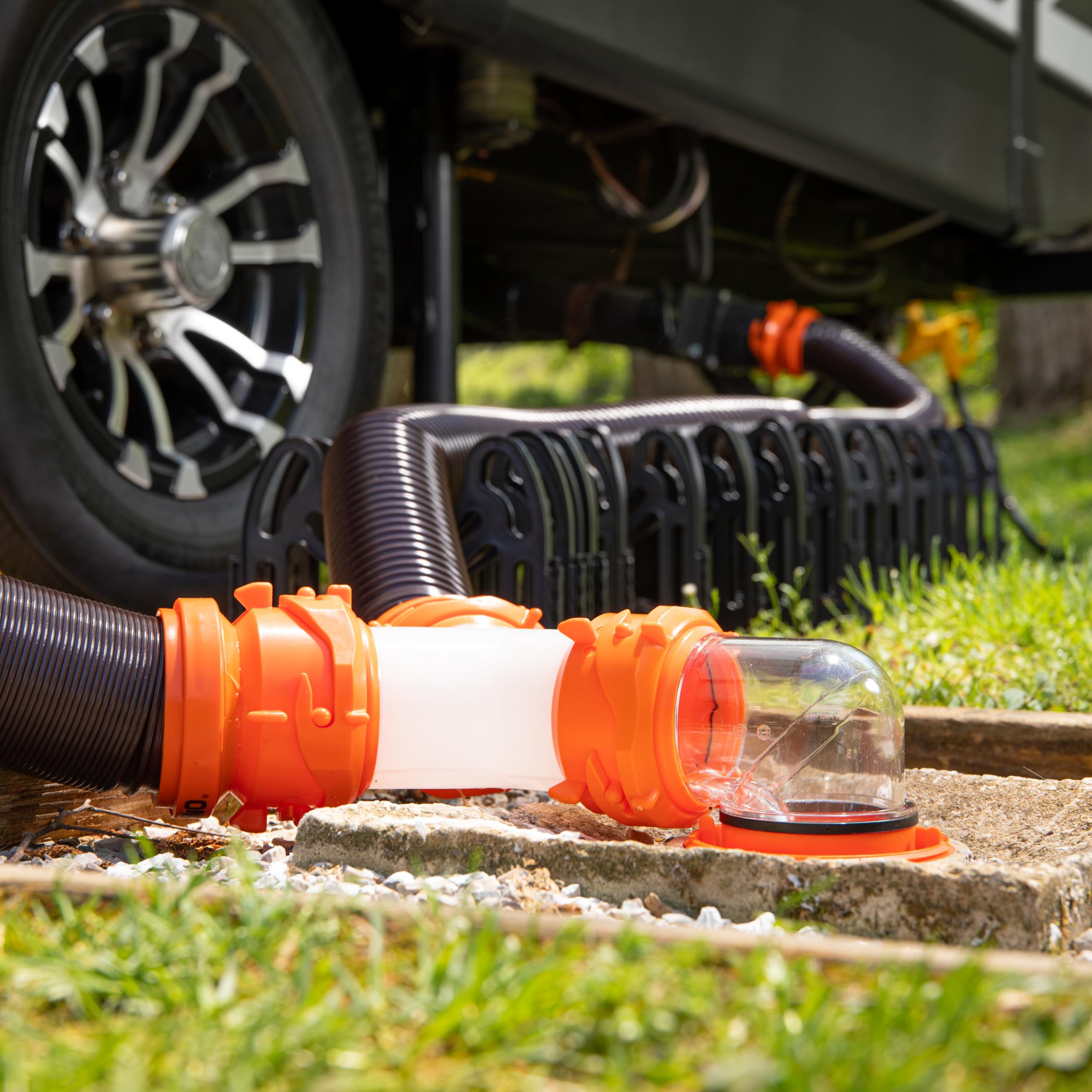 Camco RhinoFlex Clear RV Sewer Hose Elbow with 4-in-1 Adapter - Features a 360-Degree Fitting Rotation and Built-in Gasket for Odor-Tight Protection - Fits 4 Sizes of Dump Station Inlets (39736)