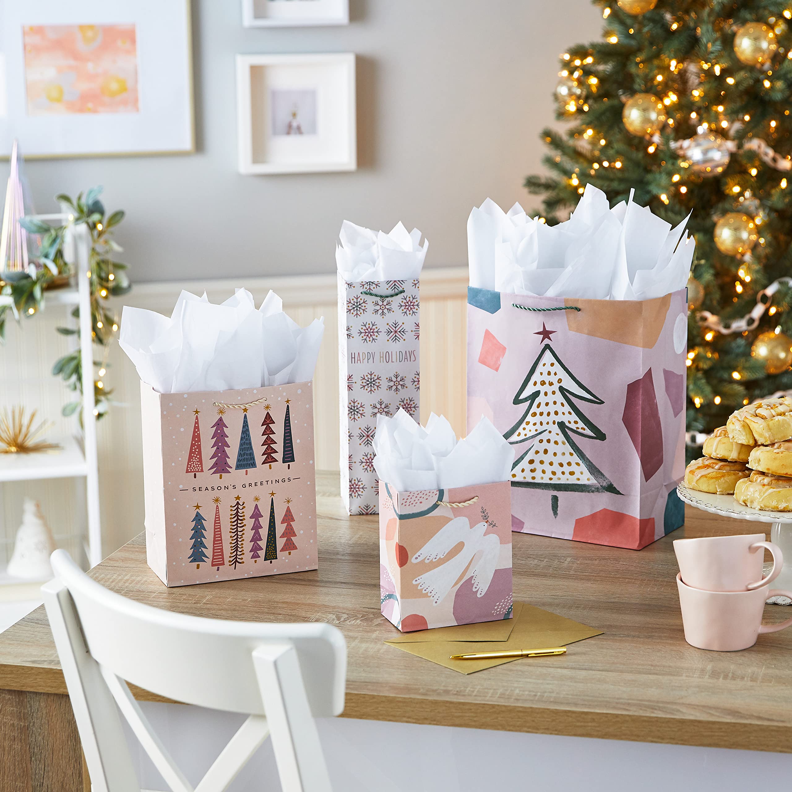 Hallmark Boho Christmas Gift Bag Assortment (8 Bags: 2 Small 6", 2 Medium 9", 2 Large 13", 2 Bottle Bags) in Pastel Pink, Purple, Hunter Green, White Dove, Snowflakes, Trees