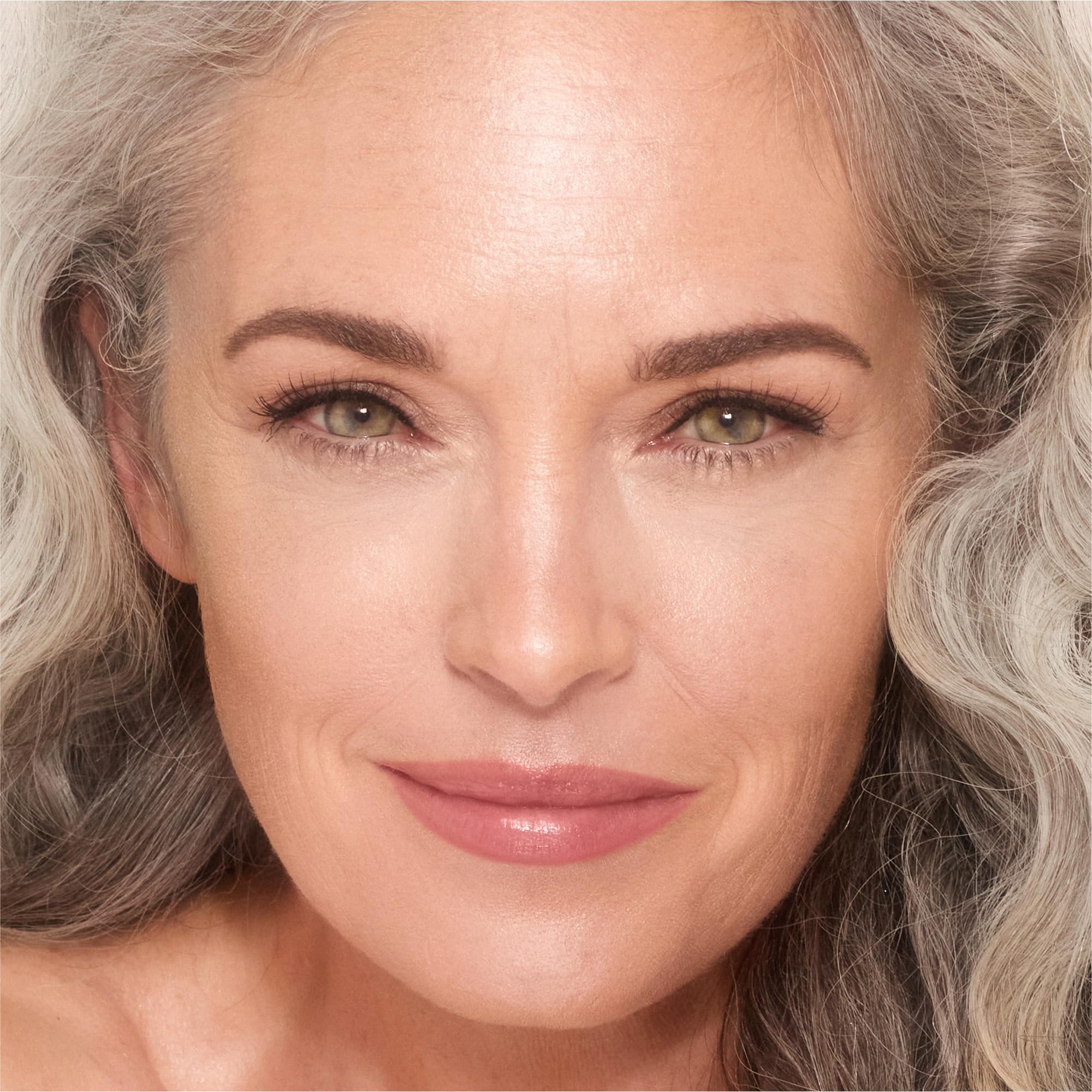 Charlotte Tilbury Unreal Skin Tint & Sheer Glow Hydrating Foundation Stick - Cream Foundation Makeup with Sheer-to-Light Coverage & a Buildable Formula - Blurring, Smoothing & Nourishing - 2 Fair