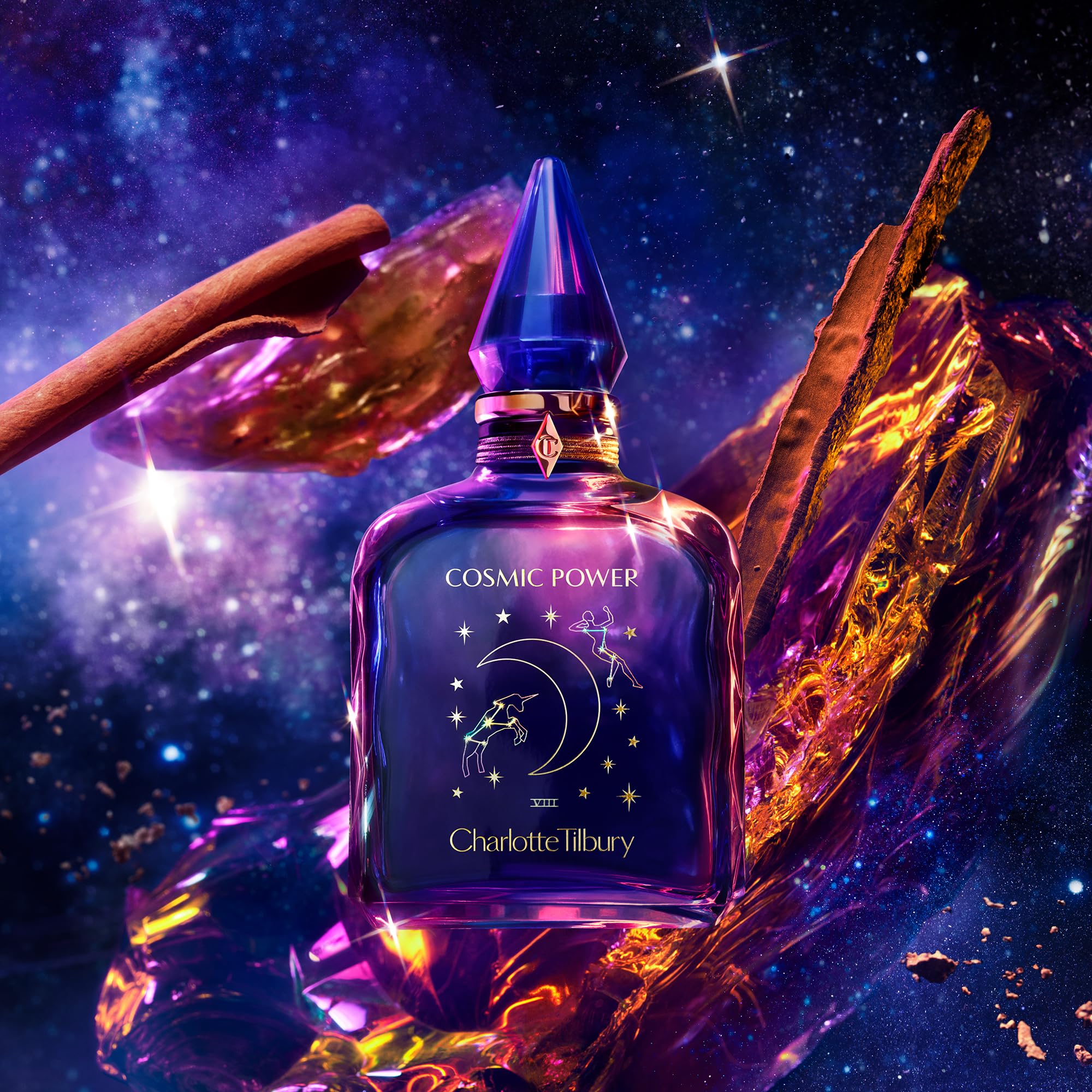Charlotte Tilbury Cosmic Power Eau De Parfum - Emotion-Boosting Amber Perfume Enriched with Naturally-Derived Oils - Long-Lasting Scent with Notes of Frankincense Accord, Cinnamon & Clove Oil (10ml)