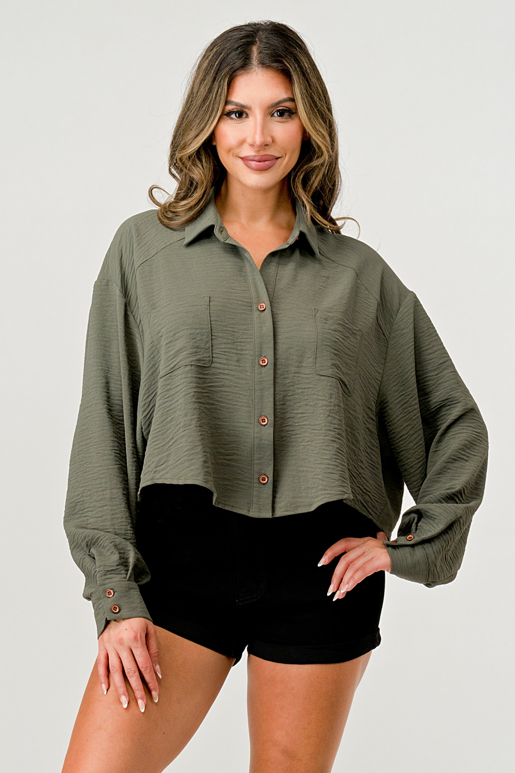 Loose fit solid woven shirt top with button front