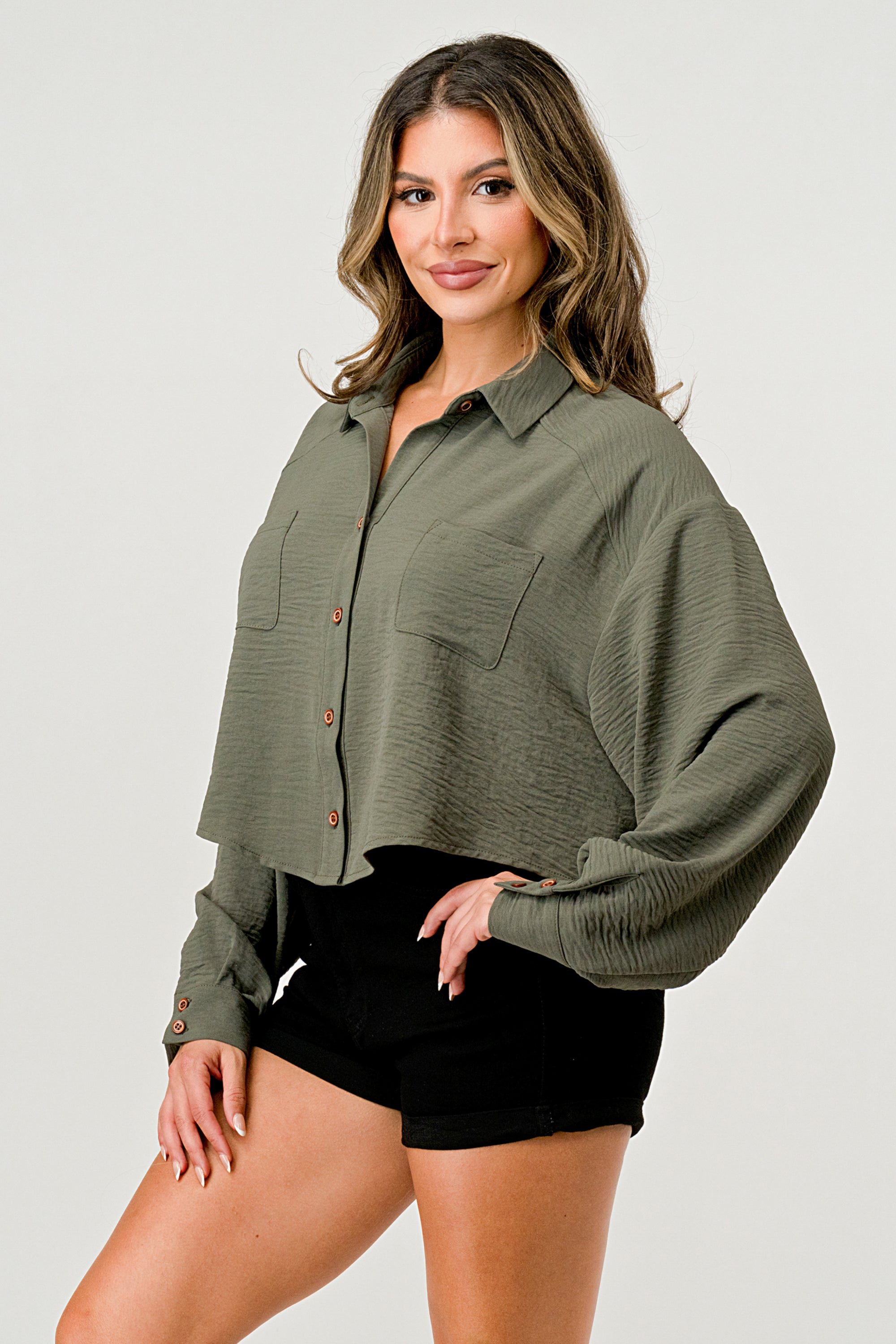 Loose fit solid woven shirt top with button front