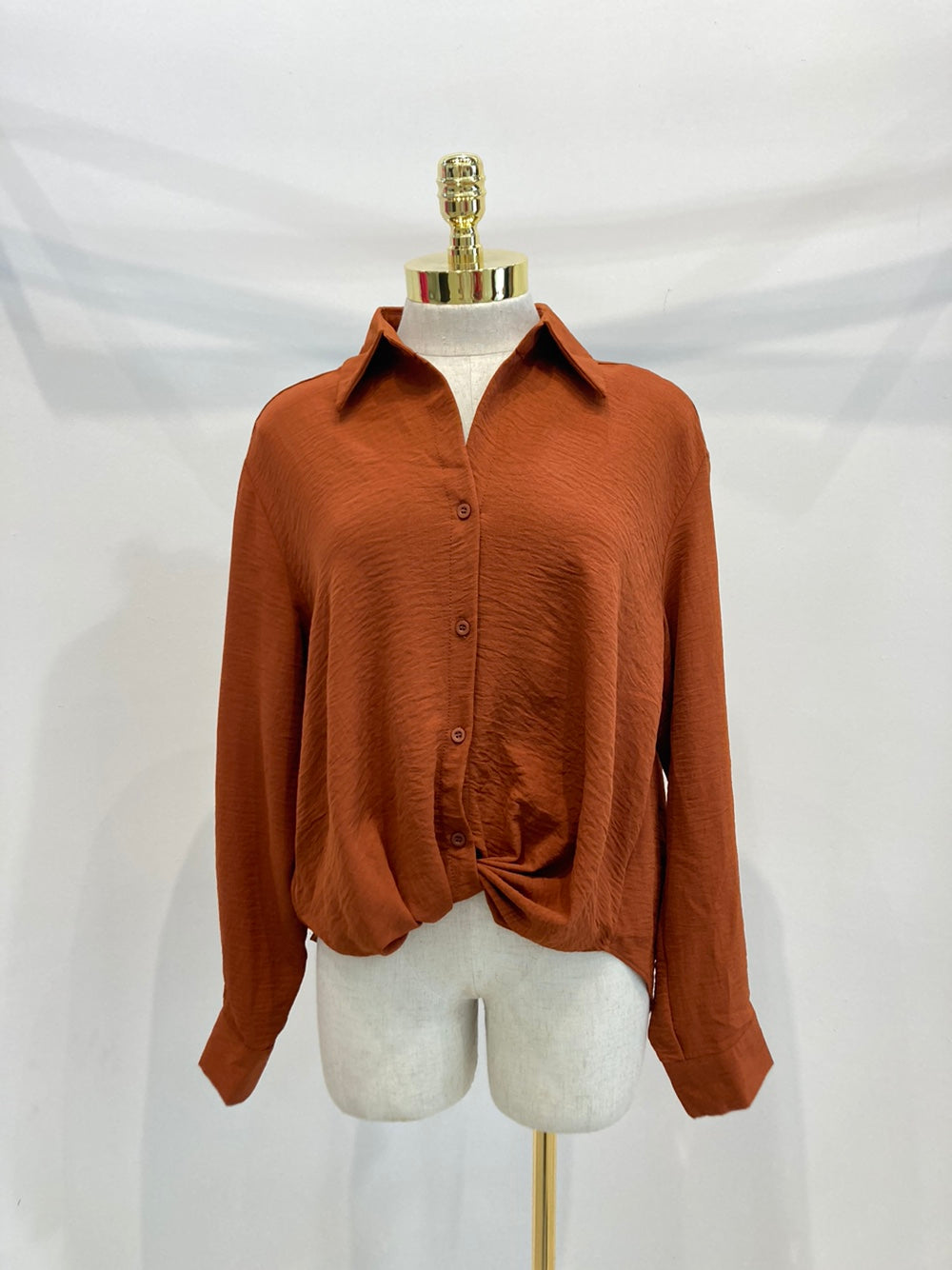 Knotted waist button front long sleeve sold shirt