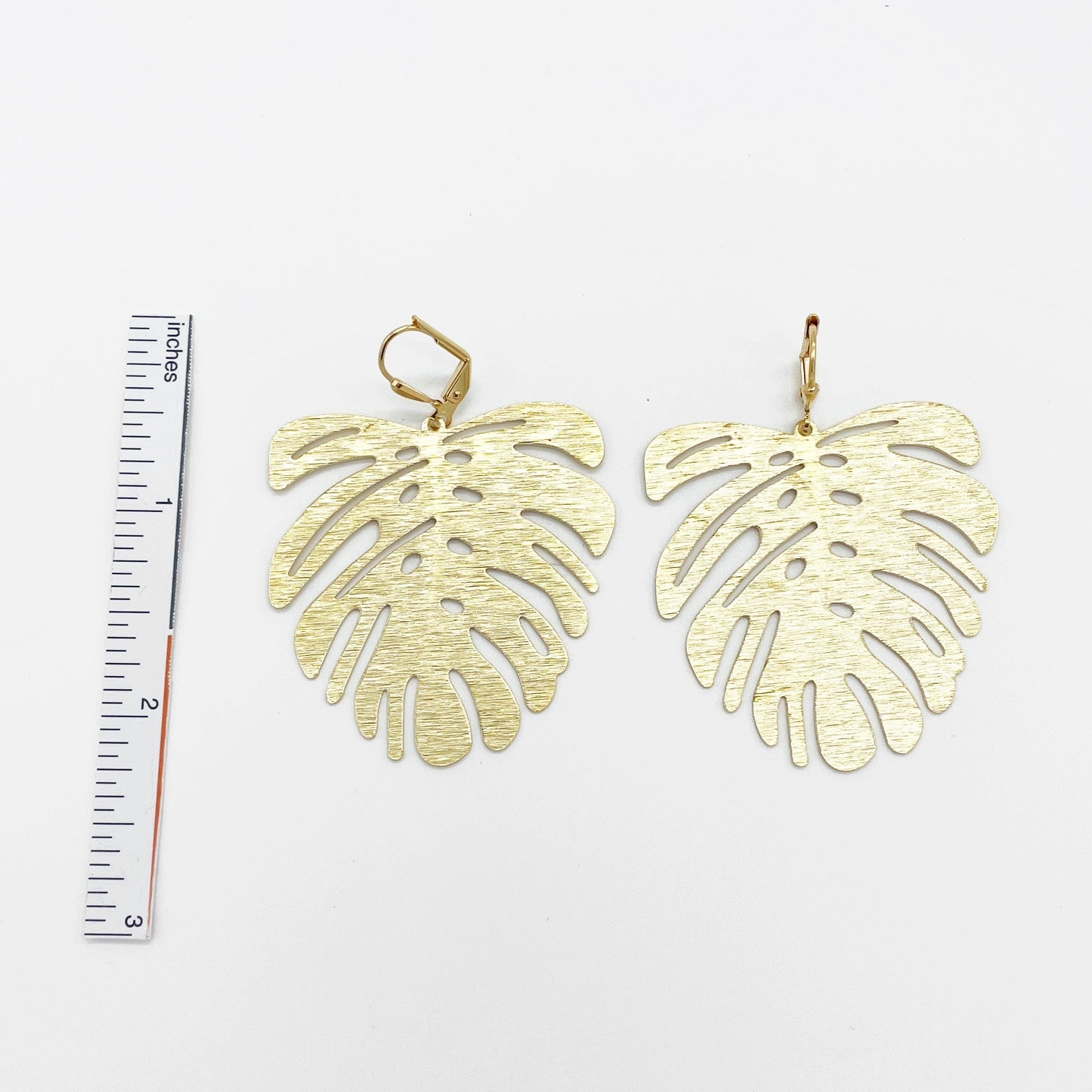 Monstera Dangle Statement Earrings in Brushed Brass