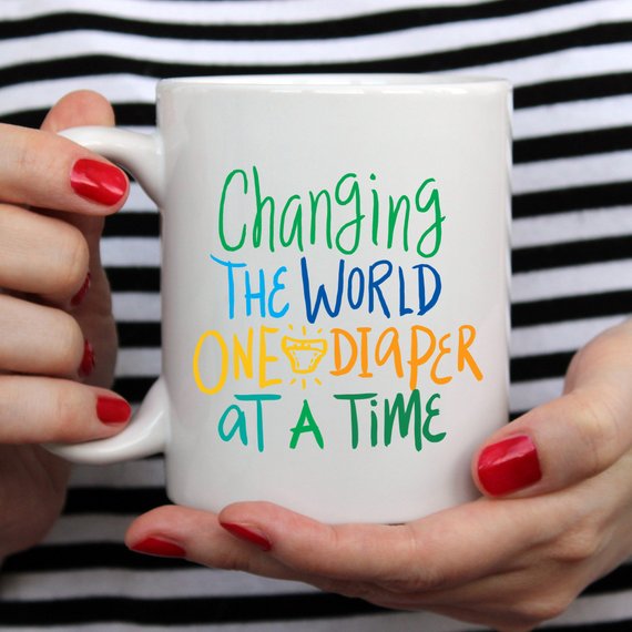 "Changing The World One Diaper at a Time" Mug