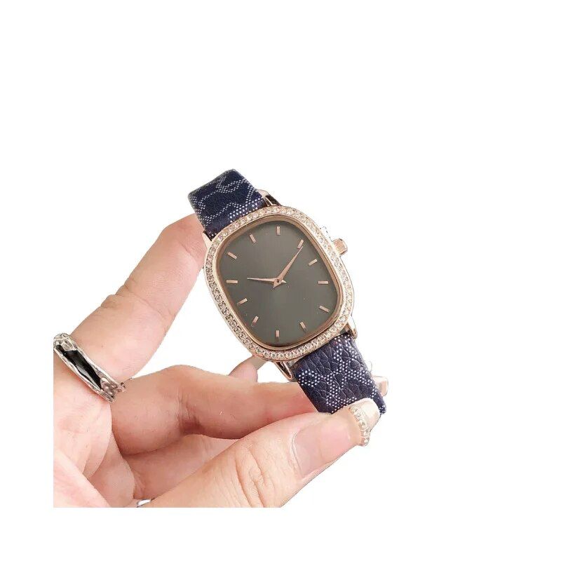 Elegant Oval Quartz Women's Watch with Diamond Accents and Leather Strap