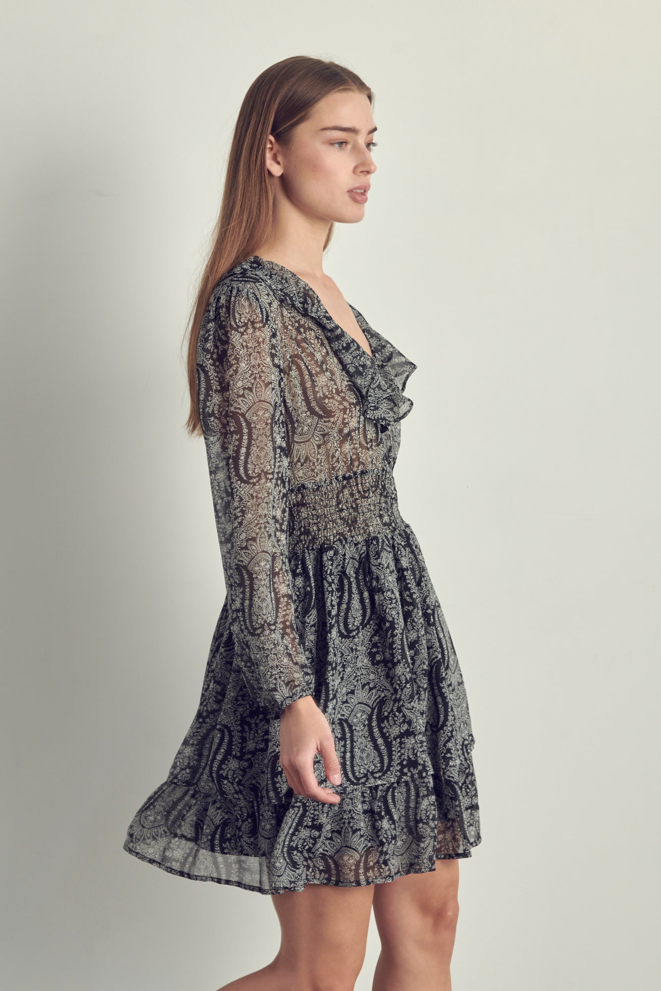 Ruffled neckline smock waisted long sleeve dress