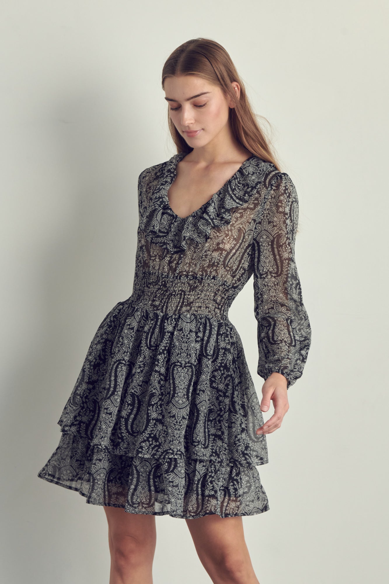 Ruffled neckline smock waisted long sleeve dress