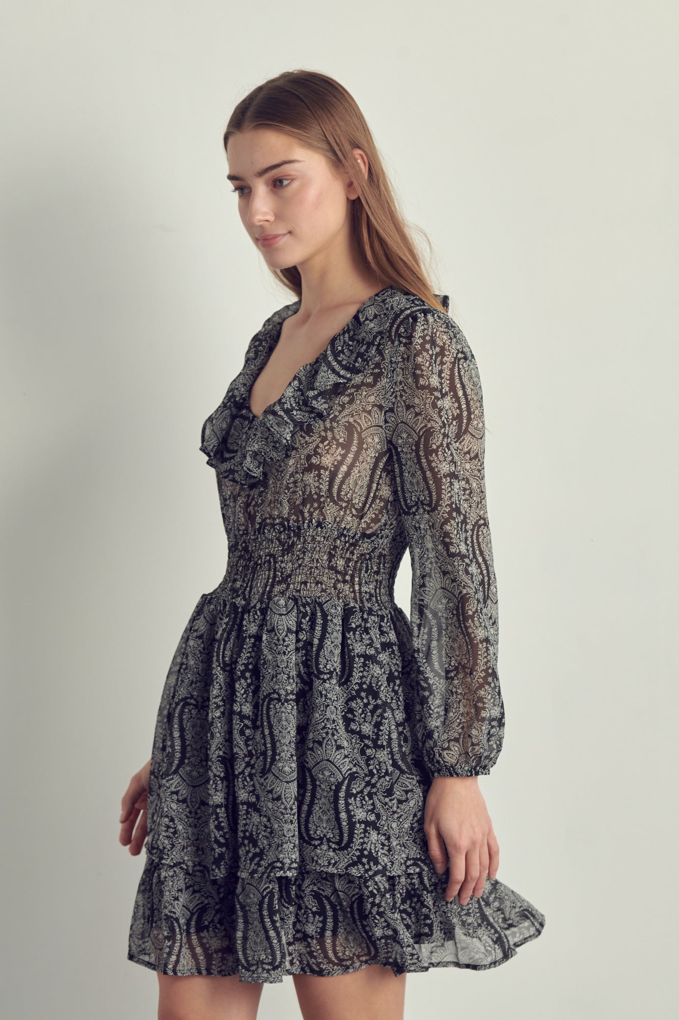 Ruffled neckline smock waisted long sleeve dress