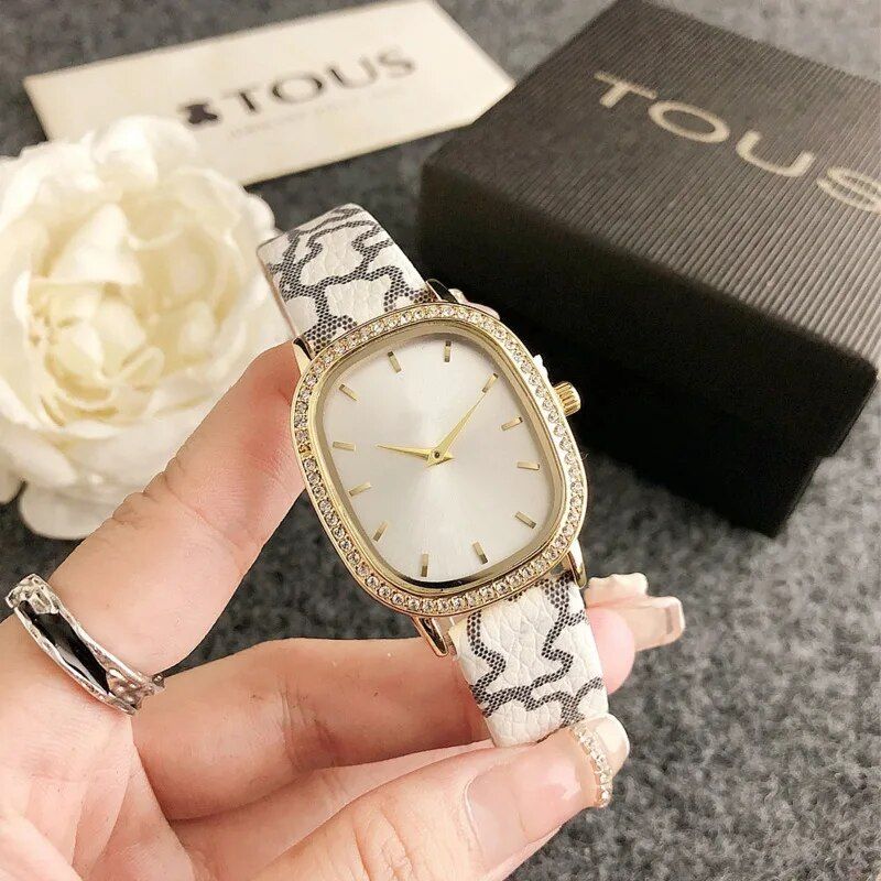 Elegant Oval Quartz Women's Watch with Diamond Accents and Leather Strap