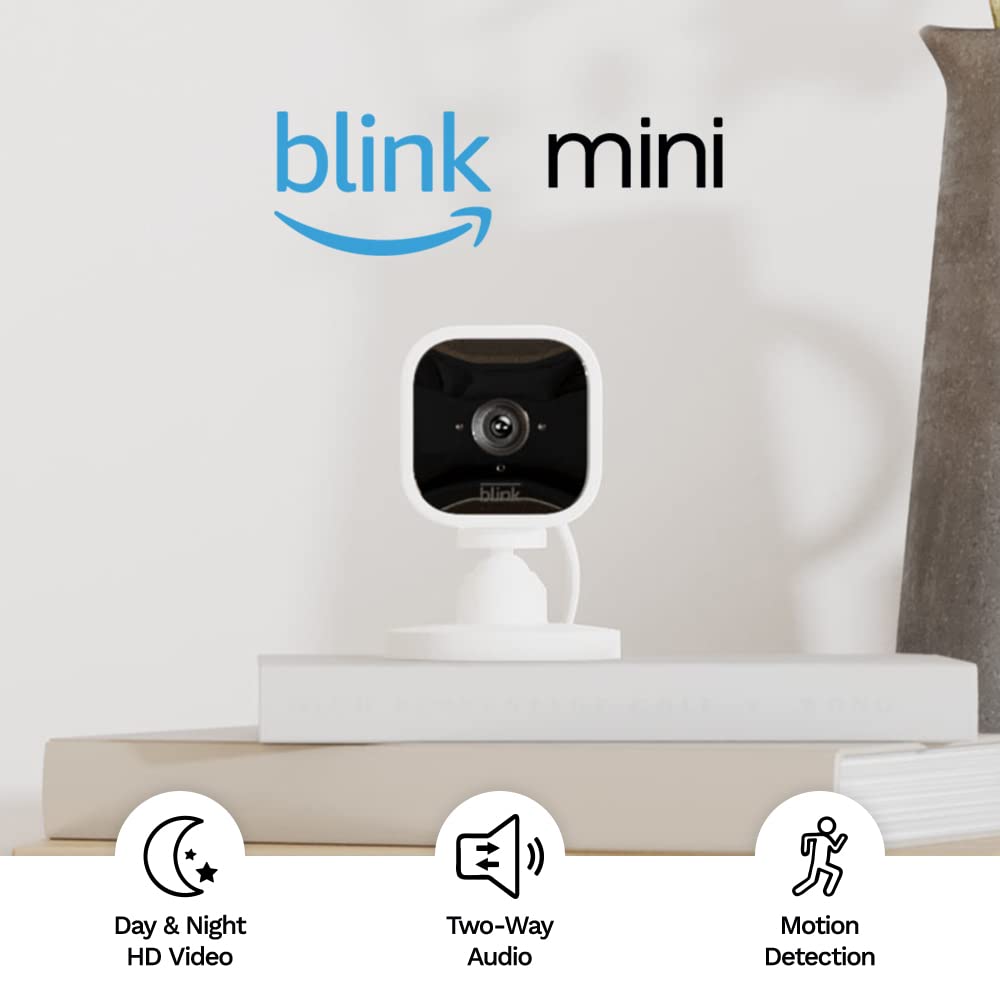 Blink Mini – Compact indoor plug-in smart security camera, 1080p HD video, night vision, motion detection, two-way audio, easy set up, Works with Alexa – 1 camera (White)