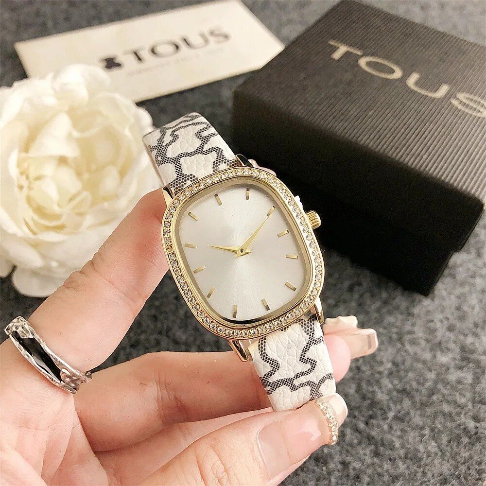 Elegant Oval Quartz Women's Watch with Diamond Accents and Leather Strap