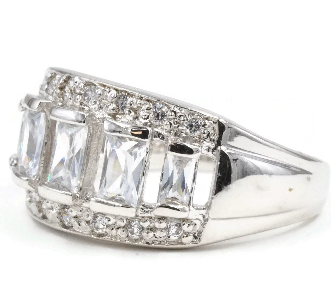 Graduated Emerald Cut Clear Stone Ring