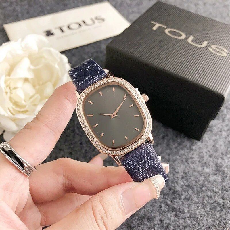 Elegant Oval Quartz Women's Watch with Diamond Accents and Leather Strap