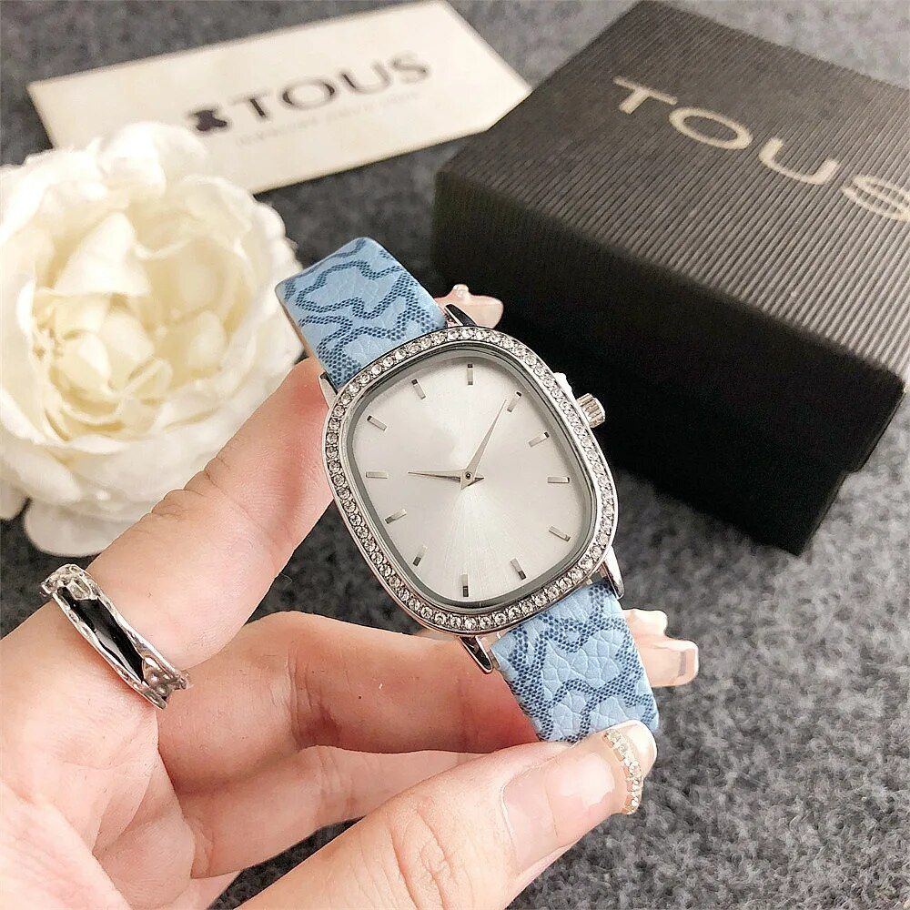 Elegant Oval Quartz Women's Watch with Diamond Accents and Leather Strap