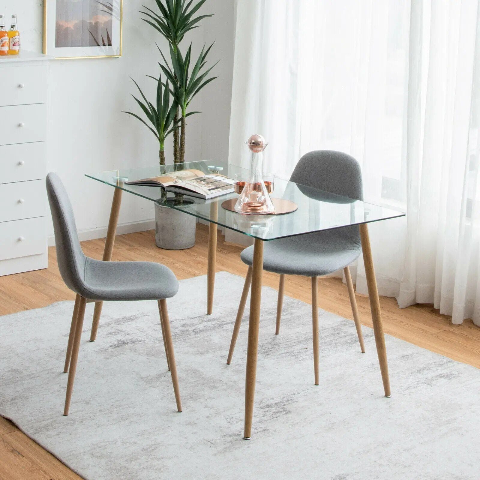 Modern Elegance Glass Dining Table with Metal Legs